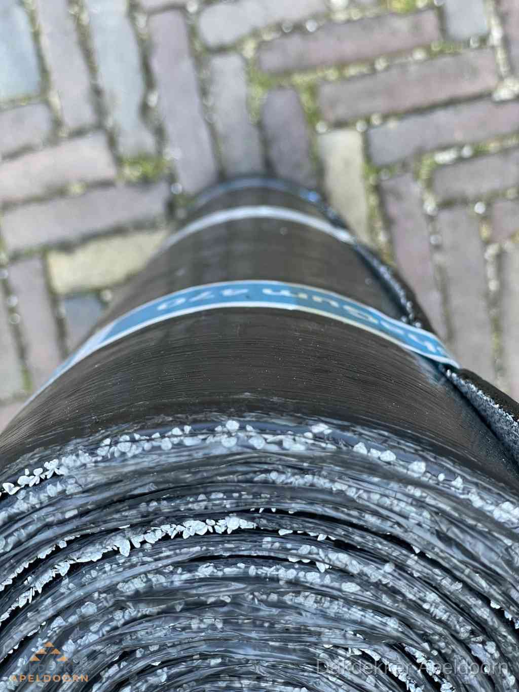 Rol bitumen dakleer met leislag voor plat dak in Apeldoorn